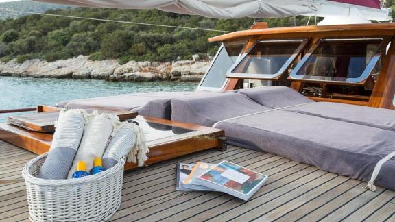 Enjoy relaxing hours on the deck of Gulet Primadonna in Bodrum, surrounded by picturesque coastal scenery.